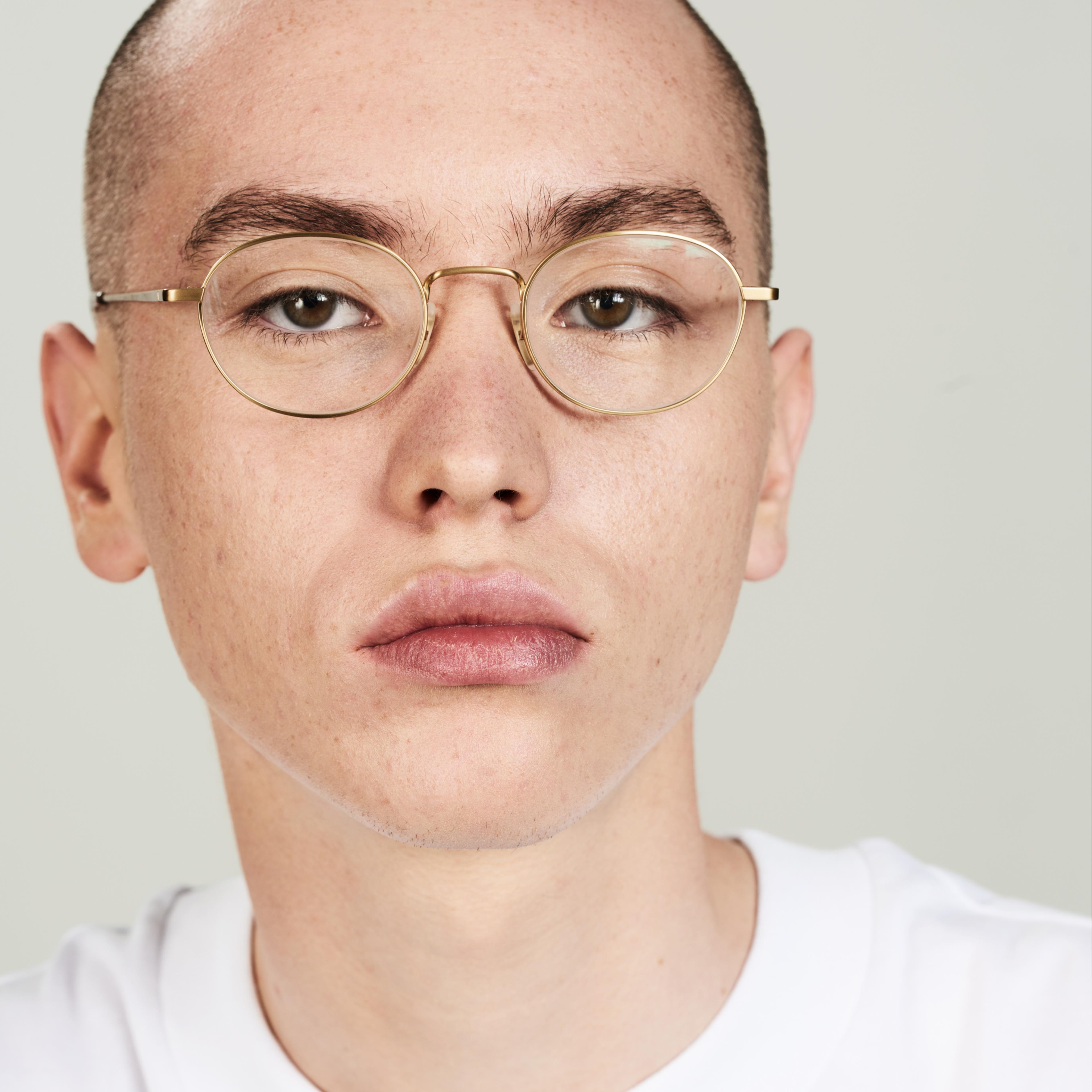 Ace & Tate Glasses | Oval Titanium in Gold