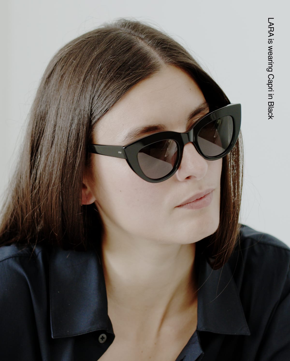 Model wearing the Capri sunglasses in Black